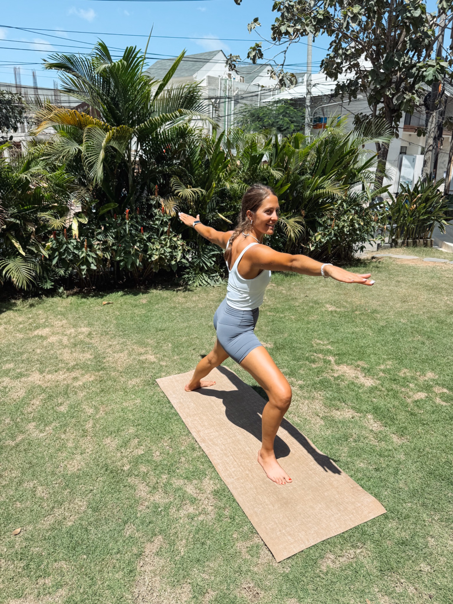 Sabrina practising yoga outdoors