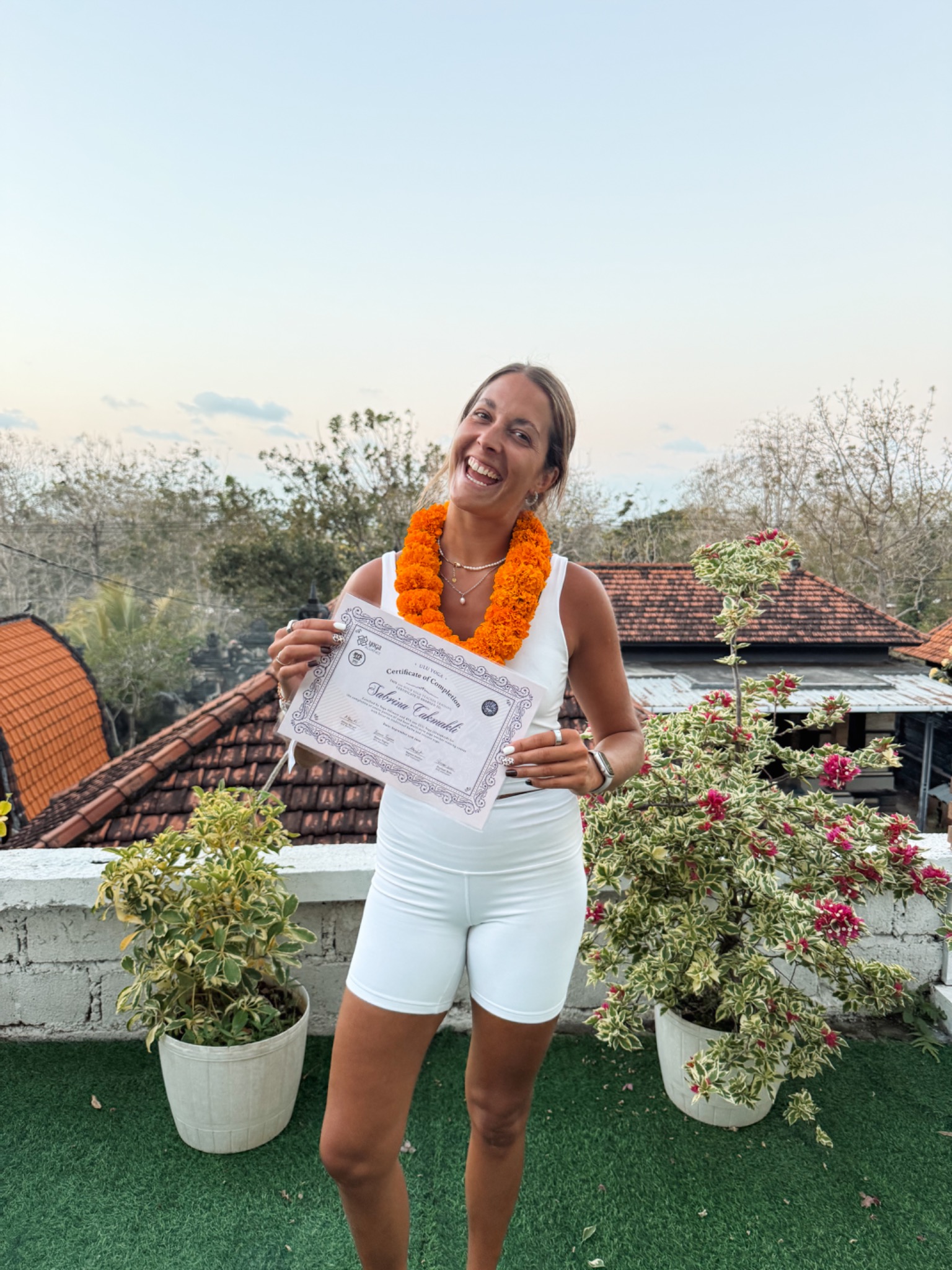 Sabrina after completing her yoga teacher training